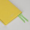 Petit carnet en cuir jaune ligné, doré sur tranche
